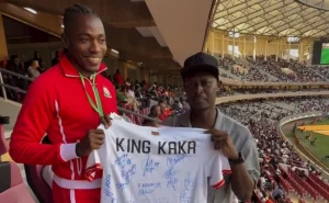 King Kaka Celebrates priceless Gift from Harambee Stars Players