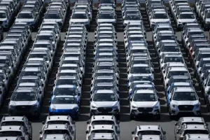 Trump signs order to lower US tariffs on Japan autos to 15%