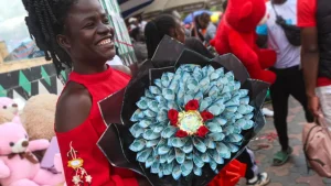 Kenyans drop flowers for Valentine’s bouquets of cash. Not everyone is impressed