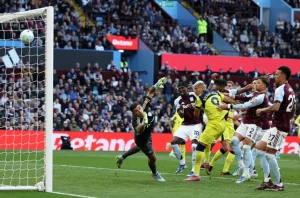 Spurs out of relegation zone after vital win at Villa