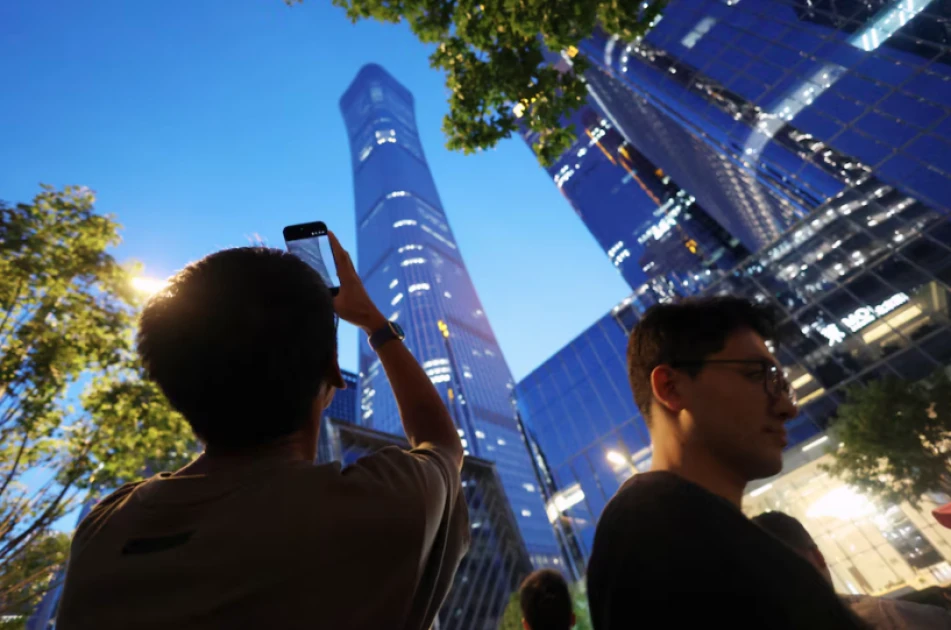 Small aircraft crashes into Beijing’s tallest building