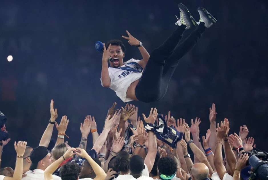 Paris celebrates football triumph amid riot recriminations