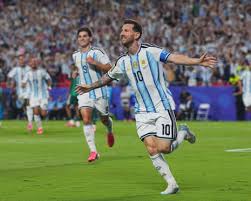 Messi ties World Cup goals record as Argentina tops Algeria