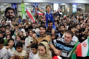 ‘Iran, Iran!’ Iranian World Cup squad serenaded on return home