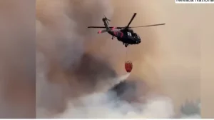 Nearly 90,000 told to evacuate as wildfire approaches Reno, Nevada