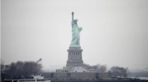 Man arrested after boat capsizes near Statue of Liberty killing woman and infant