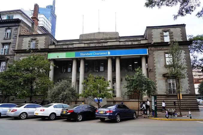 Standard Chartered cuts loan losses by 57% as bad loans improve