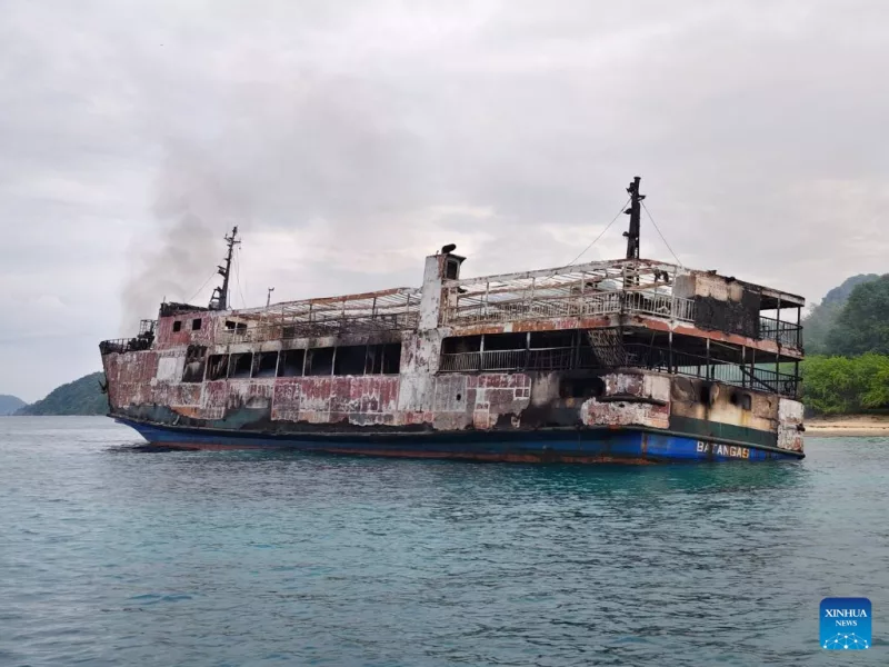 Police say it could take months to identify Philippine ferry fire victims