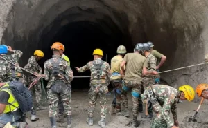 Nepal rescuers blast hillside in search of hydropower workers as families wait anxiously